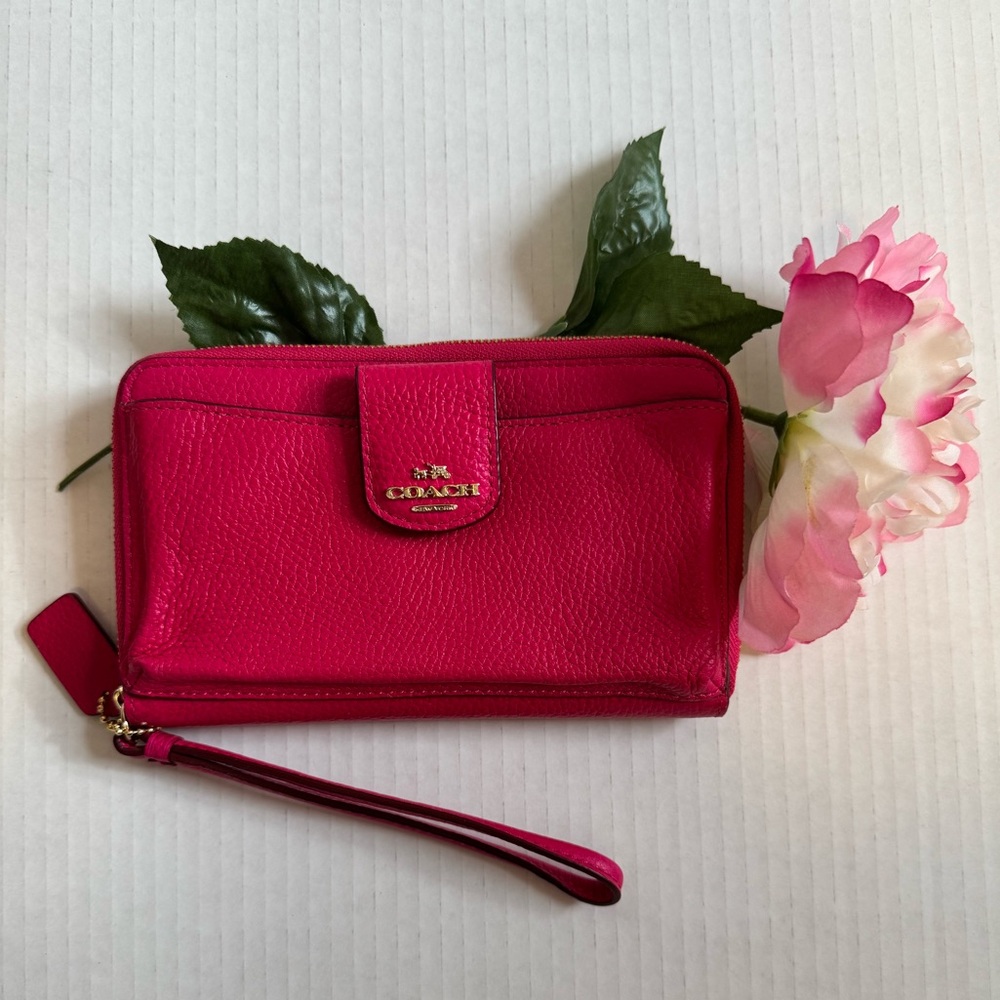 COACH Pink pebbled leather wallet/wristlet.
Phone pocket, gold accents, NWOT